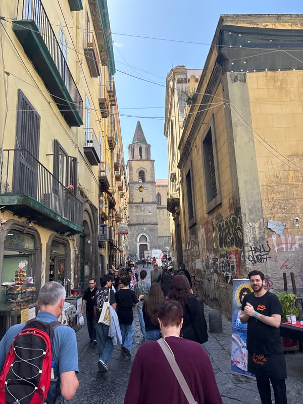 Naples street life and cuisine documented during midday hours