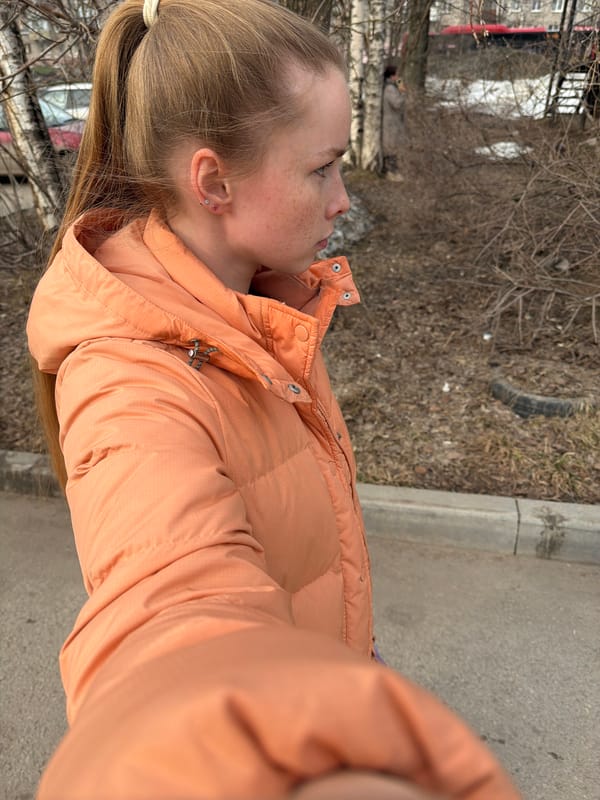 Person in orange jacket observed on Berezniki street