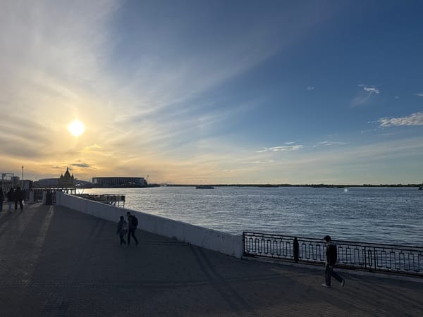Everyday moments captured along Nizhny Novgorod waterfront during sunset