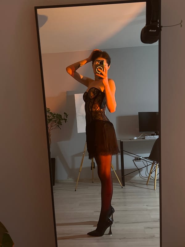 Mirror selfie in Ternopil showcasing a black lace outfit