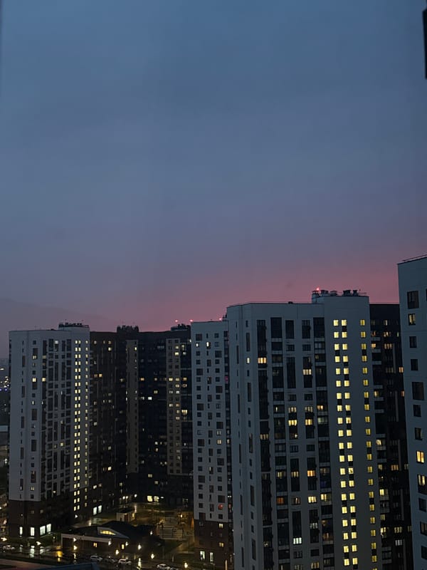 Evening lights illuminate Lyubertsy apartment towers