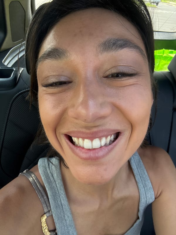 Woman captures cheerful selfie moment in Kailua
