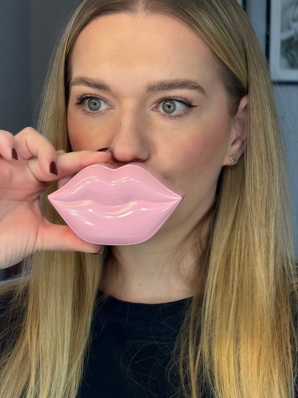 Woman takes early morning selfies at vanity mirror in Riga