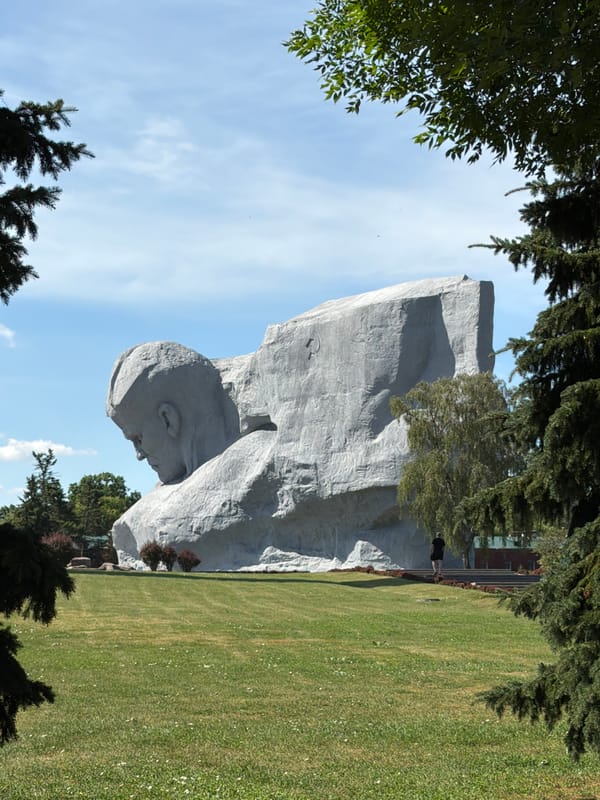 Monuments, obelisks, and a formation walk at a memorial site