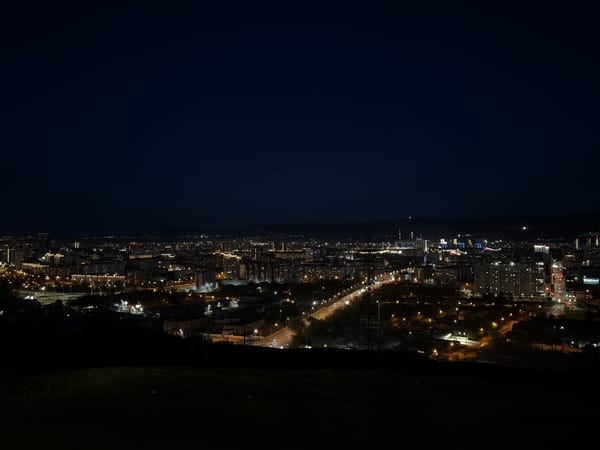Nighttime panoramic views captured of illuminated Krasnoyarsk cityscape