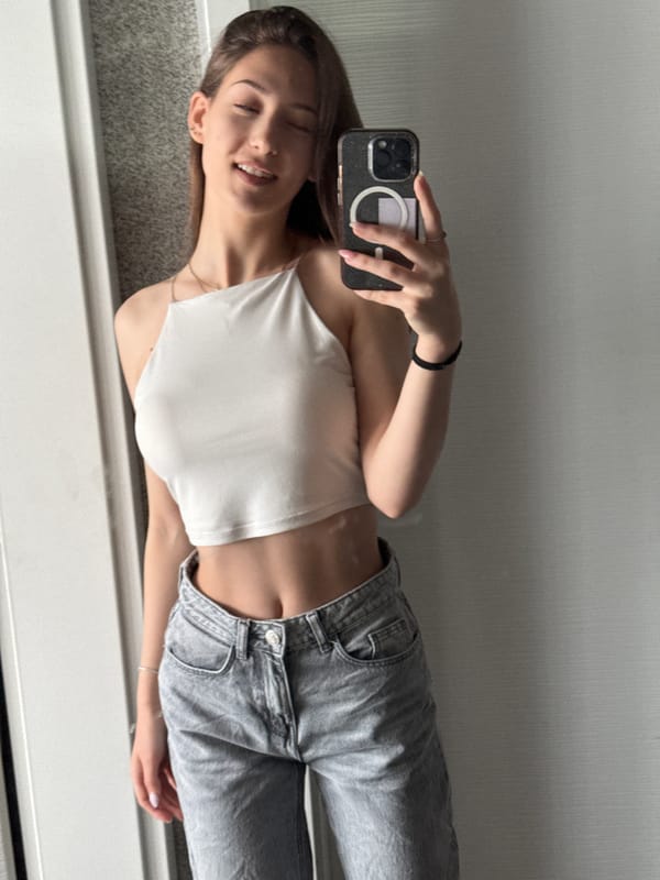 Woman takes multiple mirror selfies during morning session in Sofia