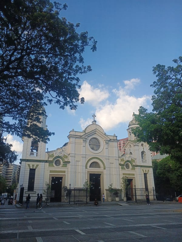 Evening street life documented around Santa Teresa Basilica, Caracas