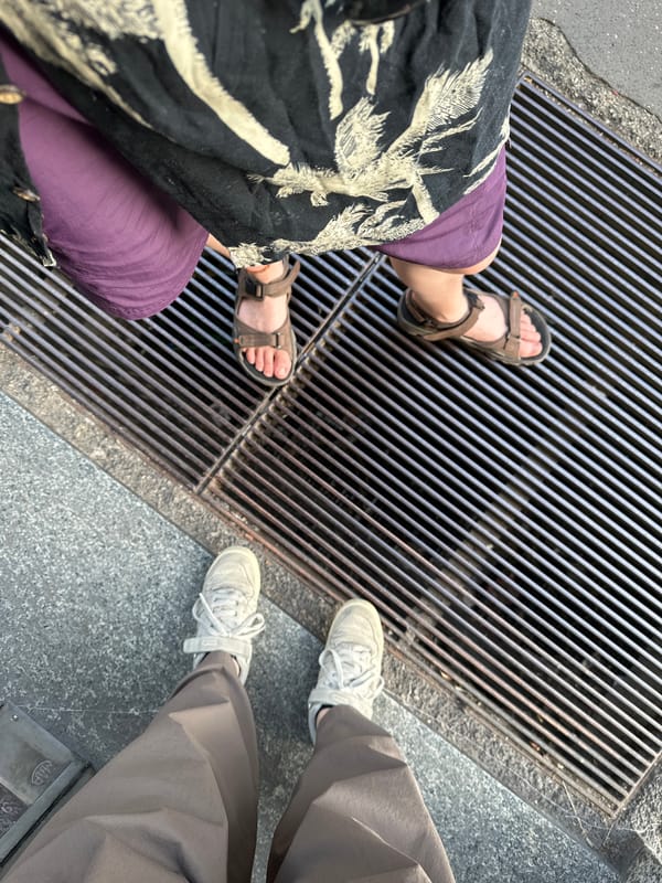 Two people photographed from different angles in Milan