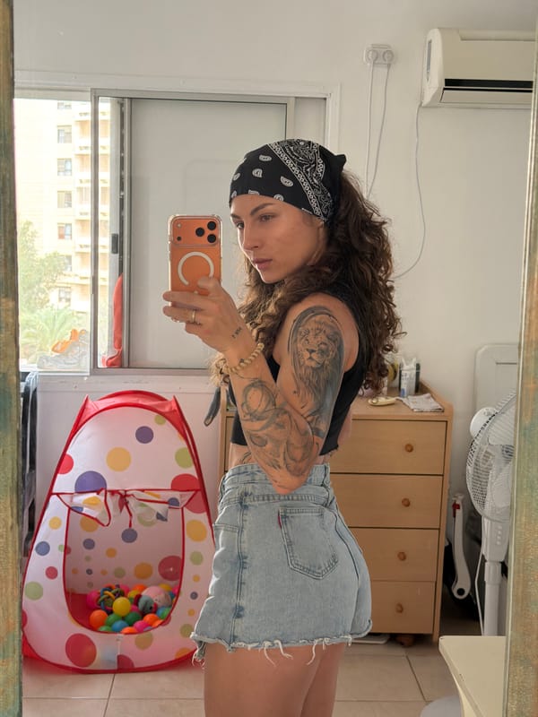 Woman takes mirror selfies in Kiryat Bialik residence