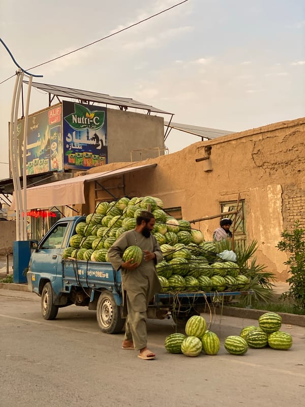 Watermelon vendor on a busy Kandahar street