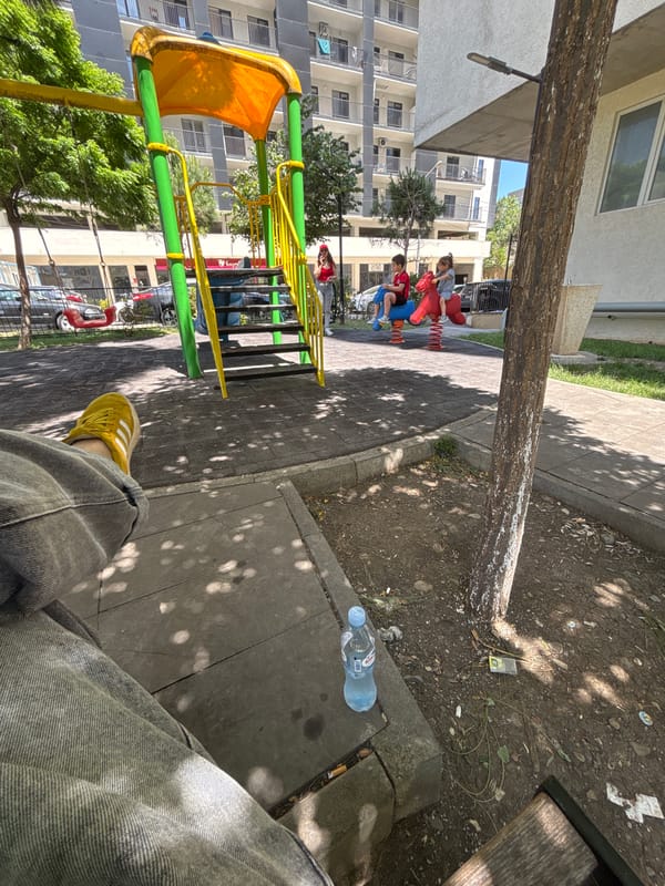 Tbilisi residential playground on a summer morning