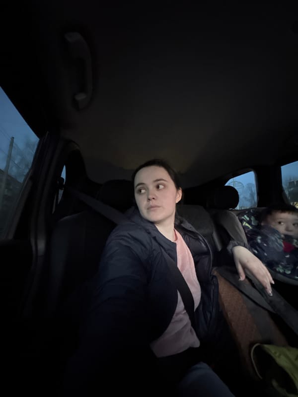 Woman photographed in passenger seat of car in Izhevsk