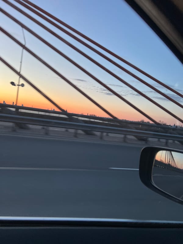 Vehicle crosses Vansu Bridge in Riga, Latvia