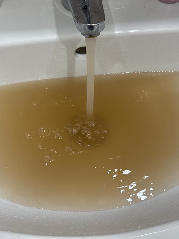 Brown water flows from bathroom faucet in Krasnodar