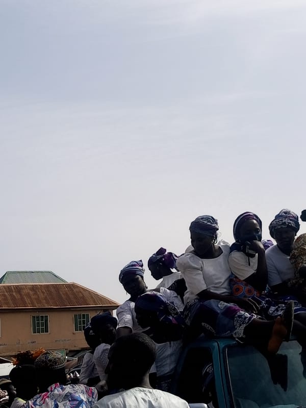 Busy marketplace activity around gas station in Gombe, Nigeria