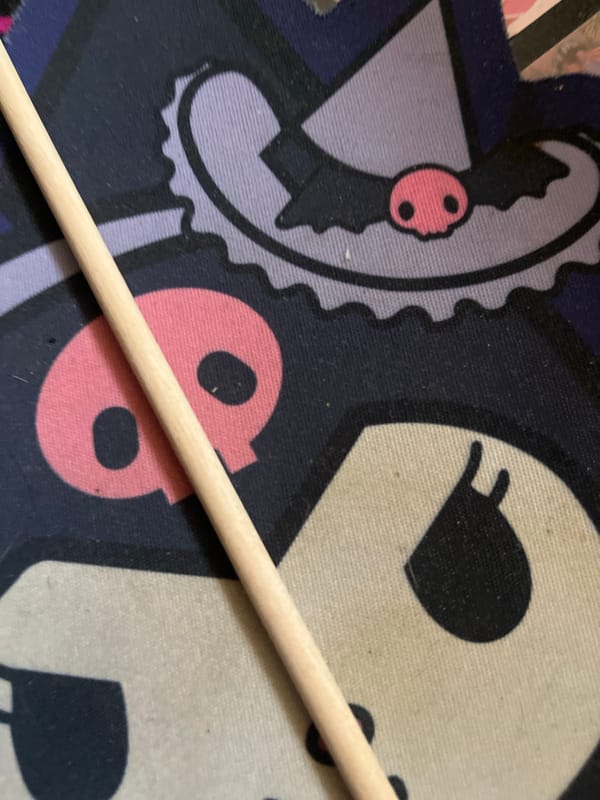 Close-up sweep of stickers, street gear, and random objects