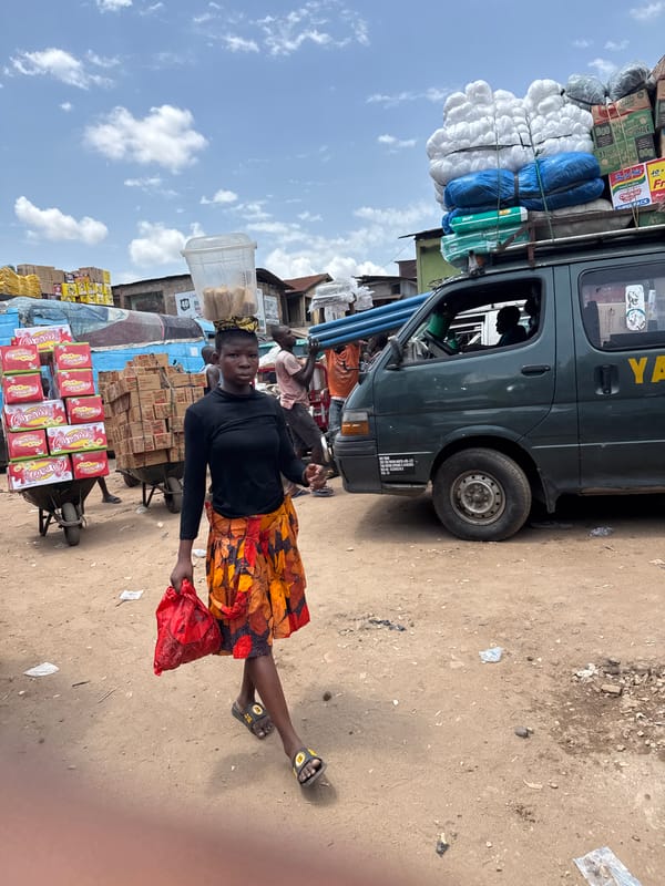 Women conduct daily commerce at Onitsha market