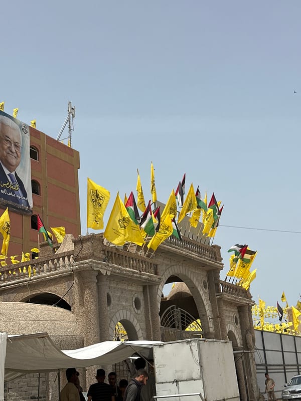 Gaza City streets display yellow and Palestinian flags