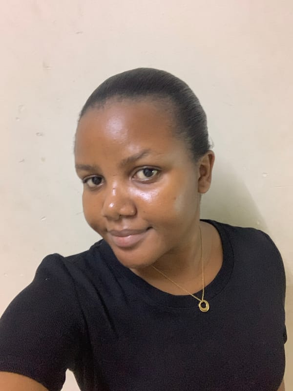 Woman captured in quiet moments at Dar es-Salaam residence