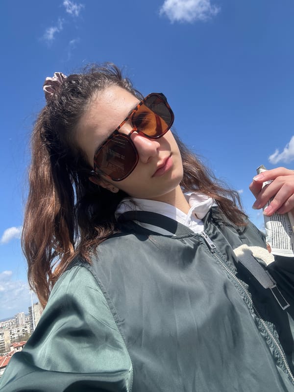 Woman photographed with package under blue sky in Ruse