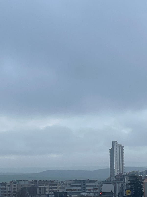 Overcast afternoon in Burgas captures cityscape and pancake cooking