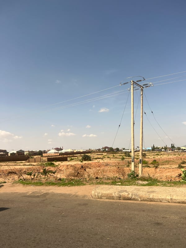 Street scenes captured in Gombe, Nigeria on clear afternoon