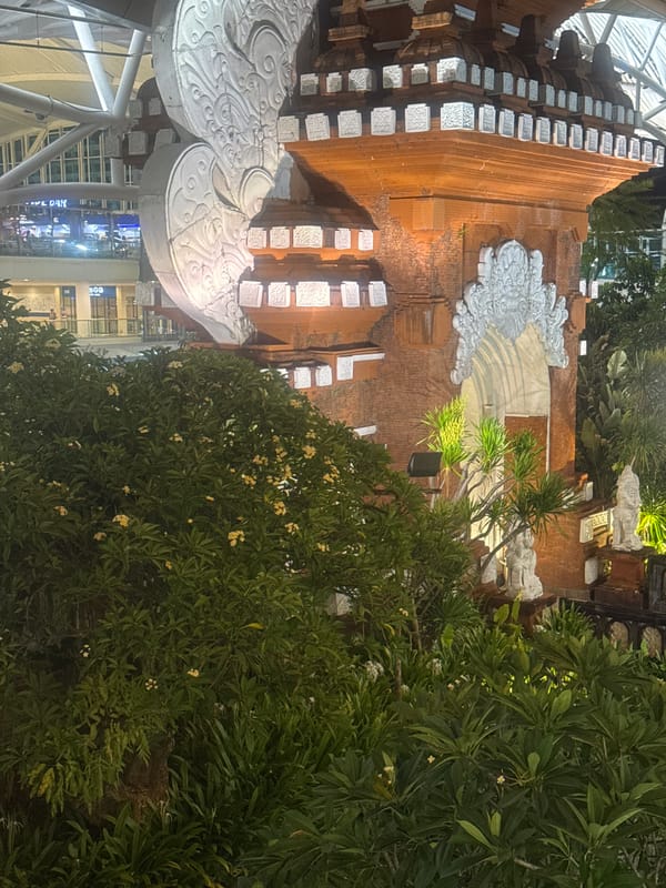 Traditional architecture and airport scenes documented in Kuta, Bali