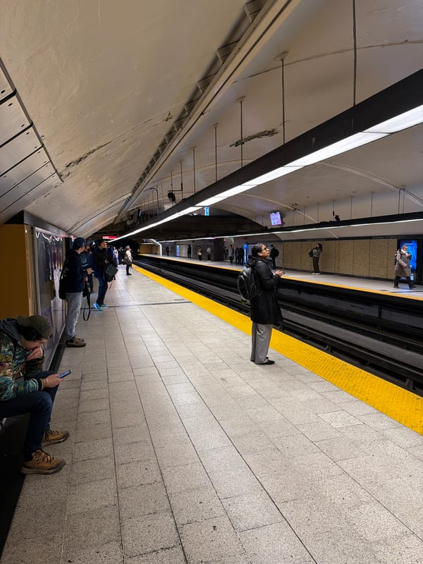 Evening commuters navigate Montreal subway station during rush hour
