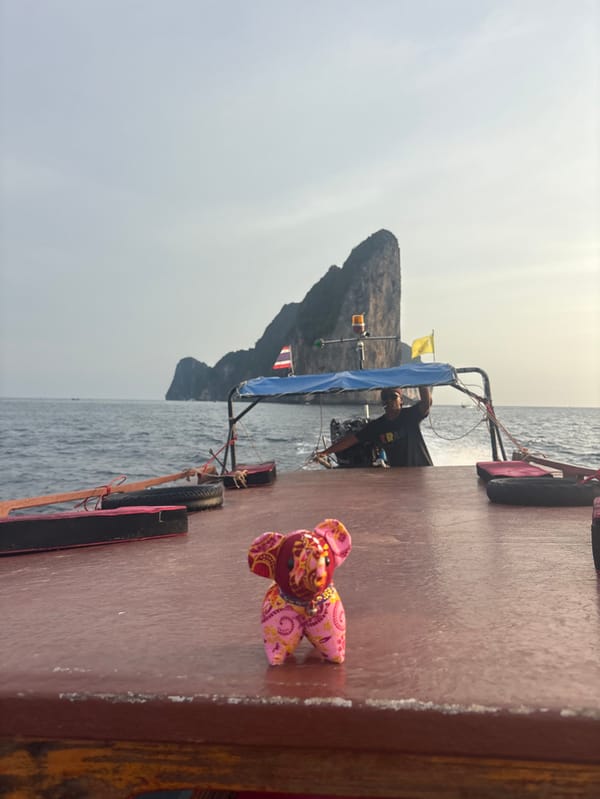 Stuffed elephant toy spotted on boat deck in Thailand