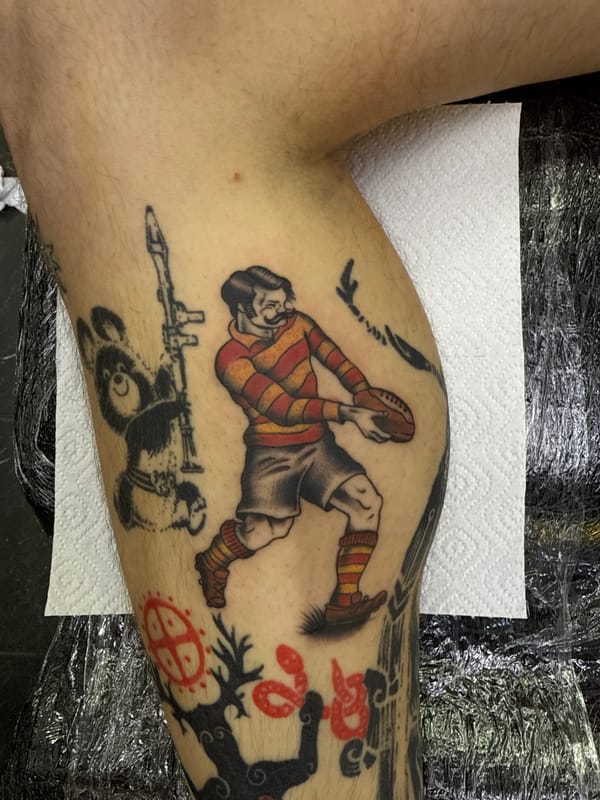 Tattooed person with rugby artwork spotted in Moscow studio