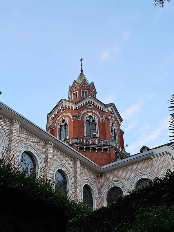 Church building photographed in Buenos Aires evening