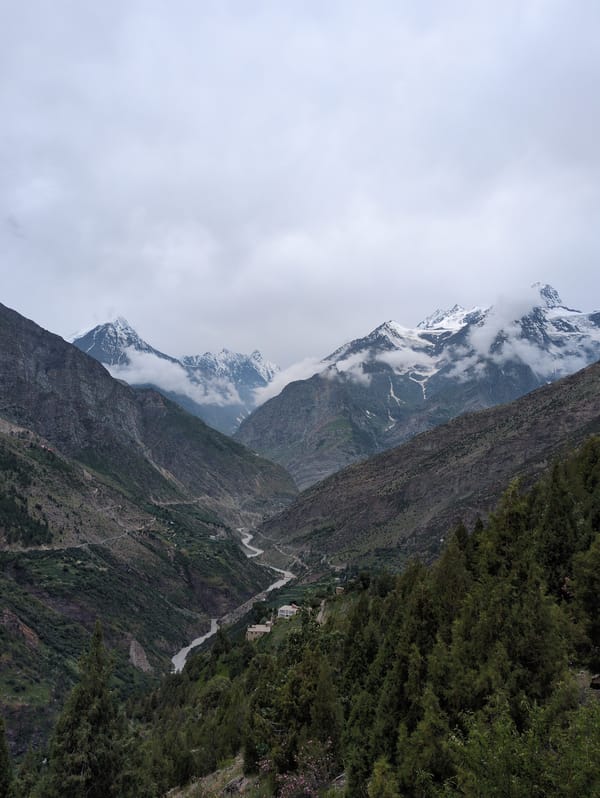 Keylong monastery and mountain valley on a July morning