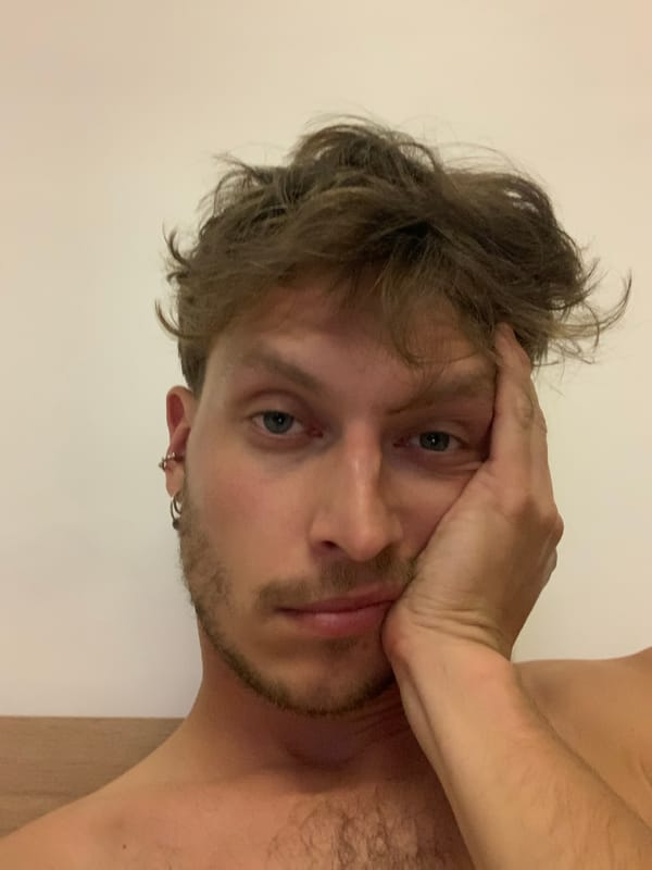 Portrait photograph captured in Tel-Aviv shows man against wall