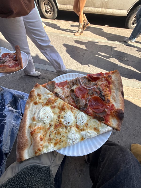 Pizza sharing moment captured in New York City