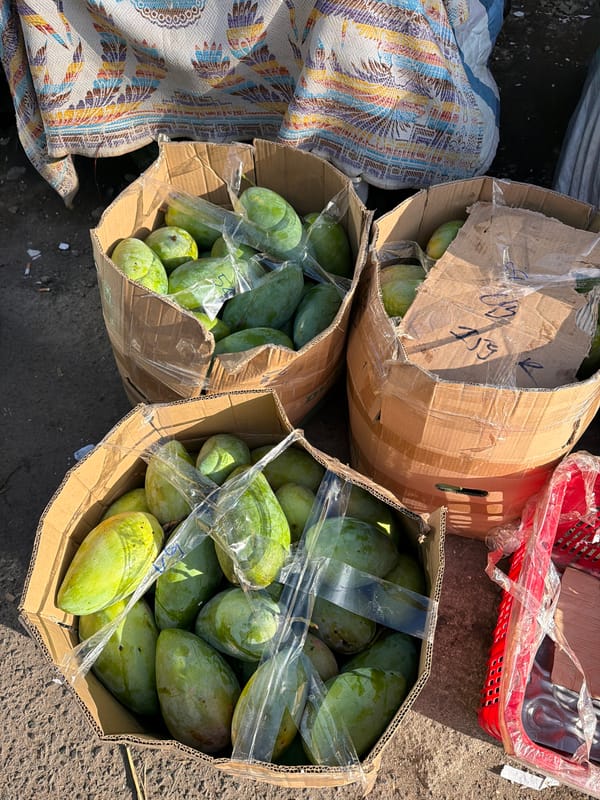 Street vendors and daily traffic along Nha Trang's busy roadside