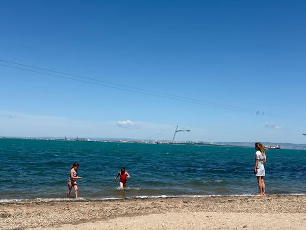 Sunny morning beach activities captured in Burgas, Bulgaria