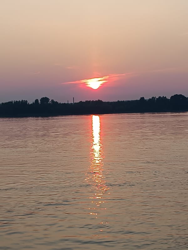 Kama River sunset, Chaikovsky — two angles, one moment