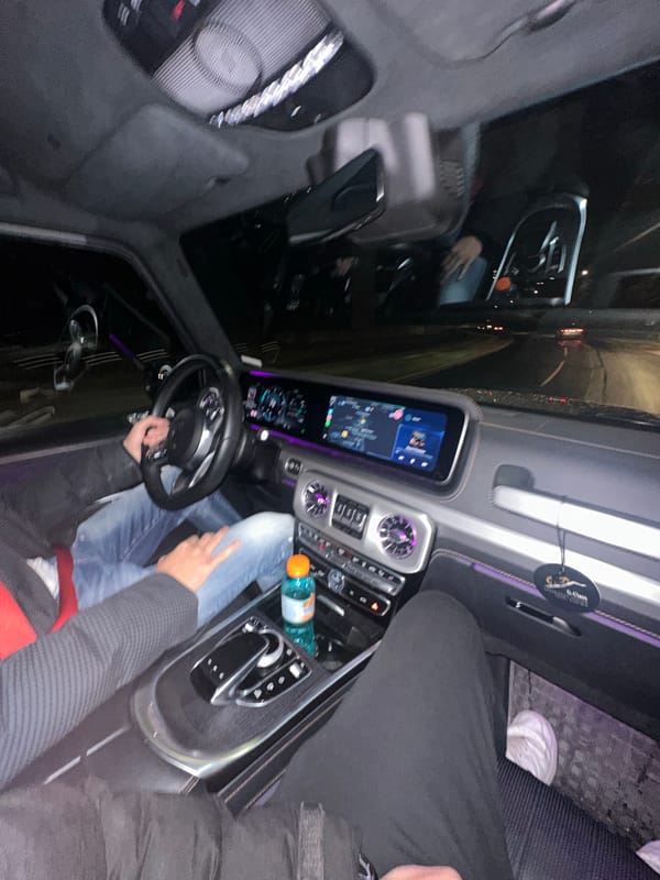 Driver photographed inside parked Mercedes G-Class in Smolyan
