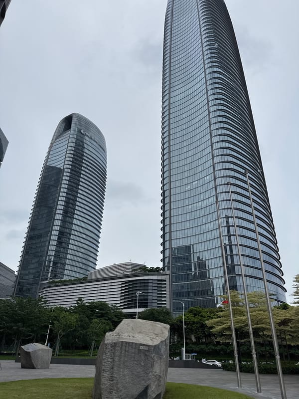 Haizhu District's commercial and residential streets on an overcast June morning
