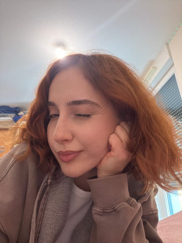 Young woman takes contemplative selfies in Strasbourg