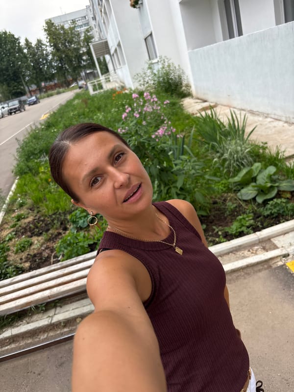 Selfies and street reflections on a rainy day in Chaikovsky