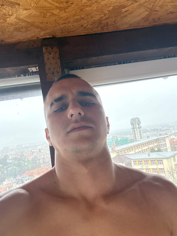 Man takes morning selfie with Shumen cityscape view