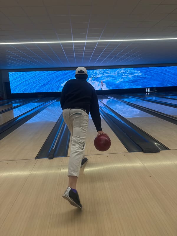 Person bowls at Milan alley Friday evening