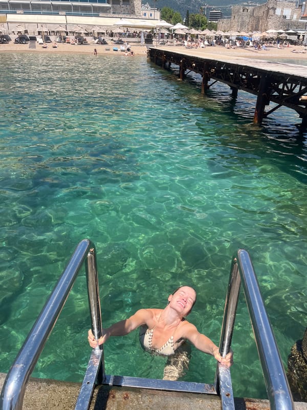Summer beach day activities captured along Budva Montenegro waterfront