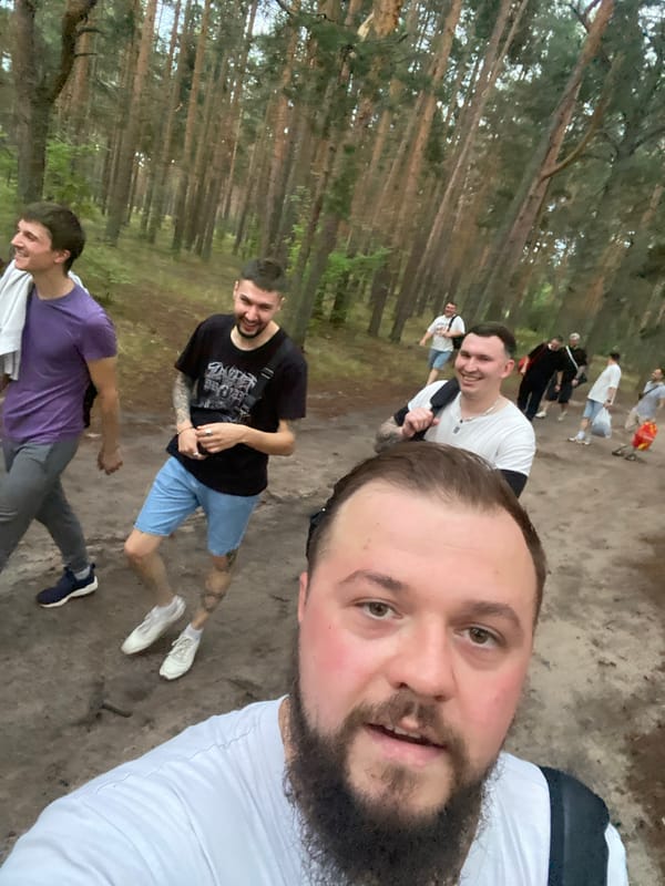 Group day out at a wooded paintball field
