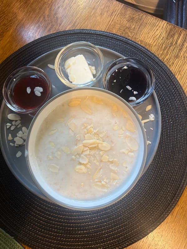 Morning oatmeal at a warmly lit rustic café