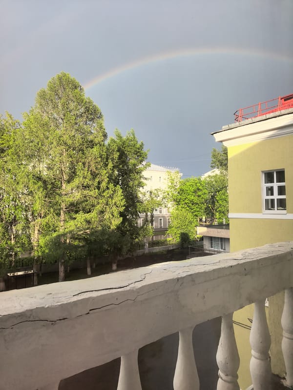 Rainbow, mother with baby, meal captured in afternoon memories