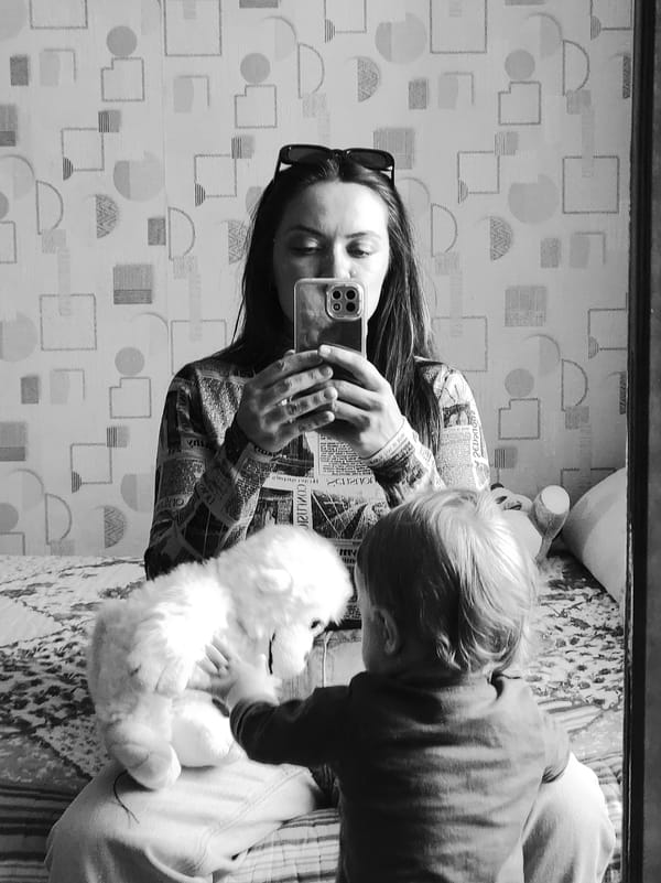 Mother and child share quiet domestic moments in Chaikovsky home