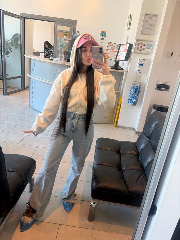 Woman visits clinic, captures street scenes in sunny Saint Petersburg