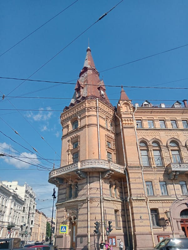 Ornate brick building with dragon ceramic murals, Saint Petersburg